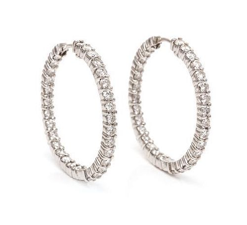 A Pair of 18 Karat White Gold and Diamond Hoop Earrings, 6.00 dwts.