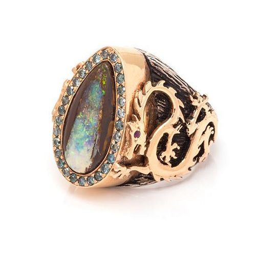 An 18 Karat Rose Gold, Sterling Silver, Opal, Colored Diamond and Ruby Dragon Motif "Objects Organique" Ring, K. Brunini, 22.