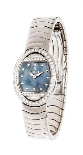 An 18 Karat White Gold, Diamond and Mother-of-Pearl "Satya" Wristwatch, Ebel, 62.10 dwts.