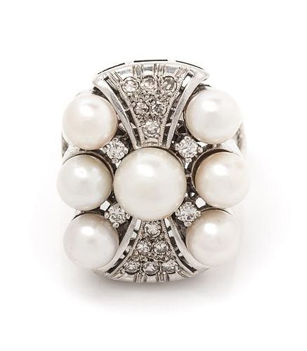* A White Gold, Cultured Pearl and Diamond Ring, 7.70 dwts.