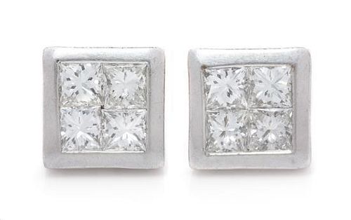A Pair of Platinum and Diamond Stud Earrings, 2.60 dwts.