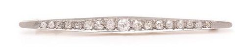 * A Platinum Topped Gold and Diamond Bar Brooch, French, 4.30 dwts.