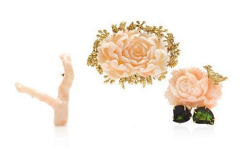 A Collection of Angel Skin Coral Brooches, 14.60 dwts.