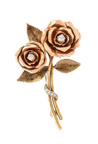 * A Retro Tricolor Gold and Diamond Flower Brooch, 11.30 dwts.