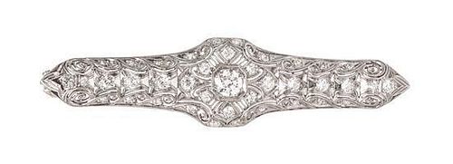 * An Art Deco Platinum and Diamond Pendant/Brooch, 10.20 dwts.