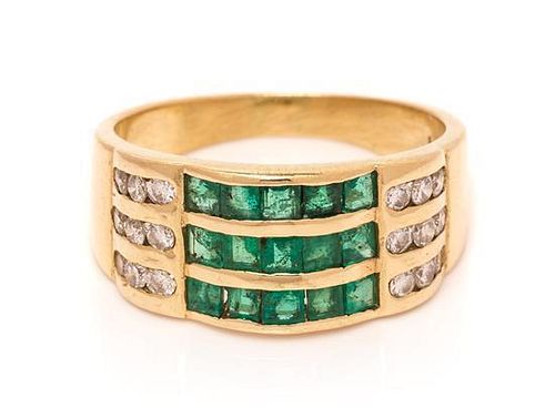 * A 14 Karat Yellow Gold, Emerald and Diamond Ring, 3.40 dwts.
