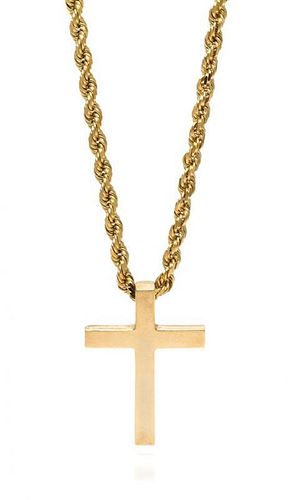 * A 14 Karat Yellow Gold Cross Pendant and Chain, 16.85 dwts.