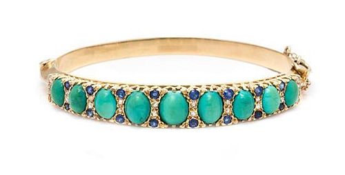 A Yellow Gold, Turquoise, Sapphire and Diamond Bangle Bracelet, 13.60 dwts.
