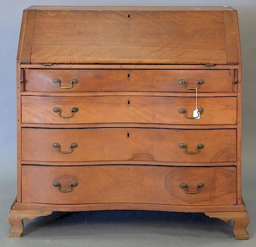 Cherry Chippendale desk with slant lid over four oxbow front drawers set on ogee feet, circa 1780 (restored).