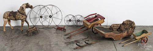 Group of painted wood animal carts, ca. 1900, together with a horse pull toy.
