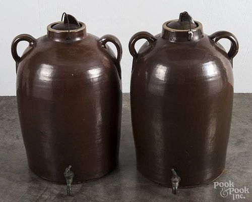 Pair of stoneware water coolers, late 19th c., 21'' h.