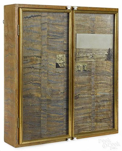 Shadow box cabinet of curiosities, 19th/20th c., having a group of family photos, an egg