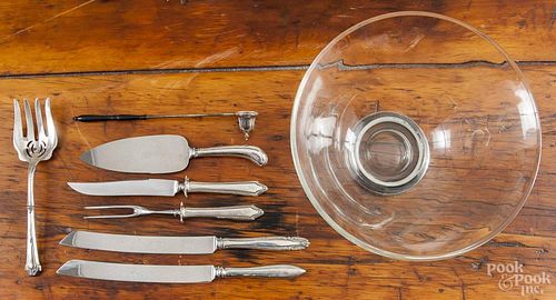 Silver mounted serving utensils, together with a glass centerpiece bowl.