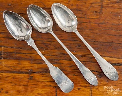 Three coin silver serving spoons, early 19th c., two bearing the touch of D. Hall