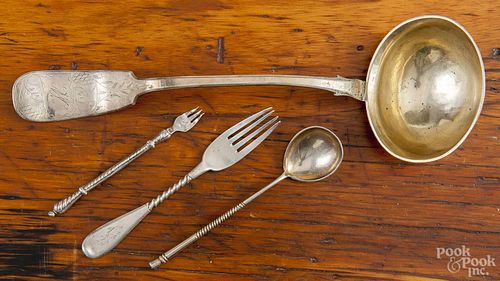 Four pieces of Russian silver, to include a ladle, a spoon, a fork, and a pickle fork, 10.6 ozt.