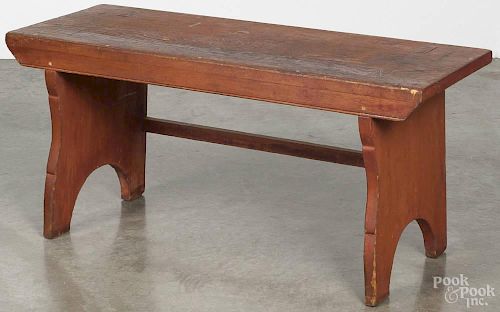 Stained pine bench, late 19th c., 17'' h., 36'' w., 13 1/2'' d.