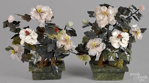 Pair of Chinese carved jade and hardstone potted flowers, 20th c., 16'' h.