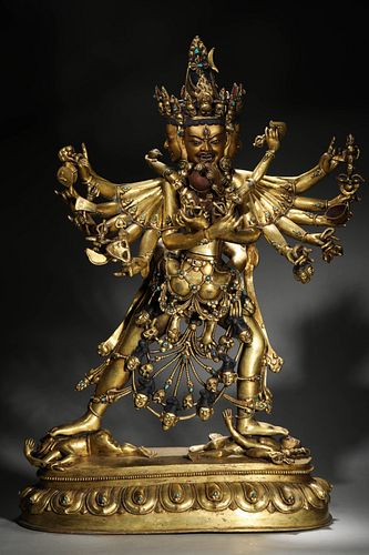 A gem-inlaid gilding copper buddha statue