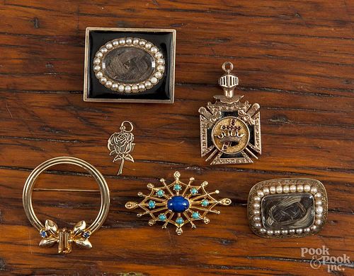 Six yellow gold pins, mostly 14K yellow gold, to include Victorian hair art, a circle