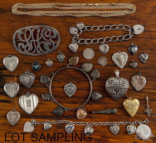 Group of heart-shaped lockets, pendants, bracelets, etc., to include sterling, vermeil