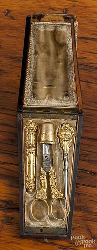 14K yellow gold ornate travel kit in a fitted box, to include a thimble, a needle case, scissors