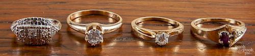 Four 14K rings, to include one white gold and three yellow gold, containing diamonds and ruby