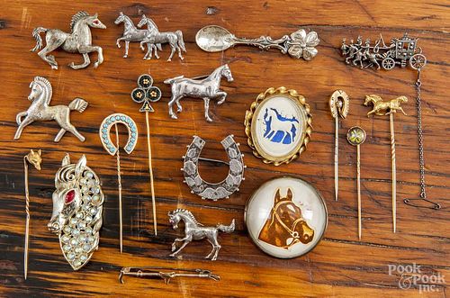 Large group of horse related jewelry, to include several sterling horse figural pins, stick pins