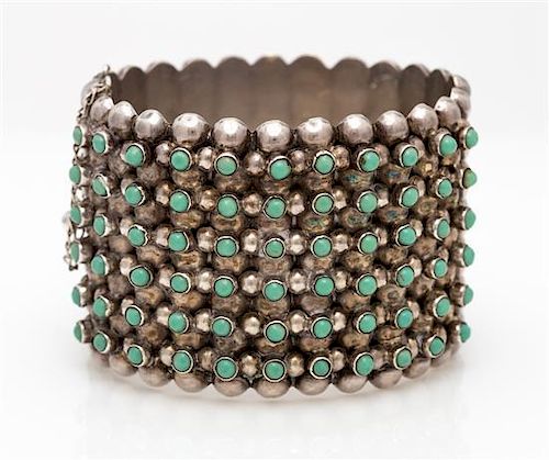 A Sterling Silver and Turquoise Dot Bangle Bracelet, Pre-1948, 49.20 dwts.
