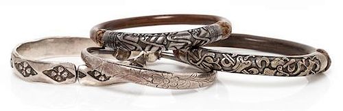 A Collection of Silver and Bamboo Bangle Bracelets, 119.90 dwts.