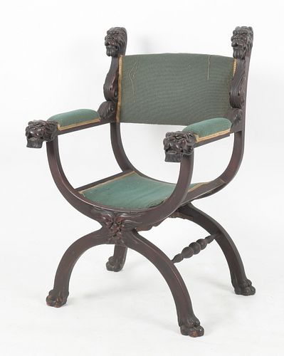 A Renaissance Revival Carved Mahogany Savonarola Chair