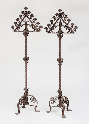 PAIR OF LARGE CONTINENTAL WROUGHT-IRON ELEVEN-LIGHT FLOOR CANDELABRA