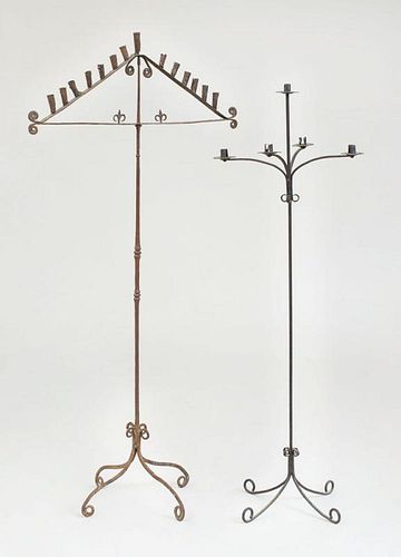 TWO CONTINENTAL WROUGHT-IRON FOUR-LIGHT CANDELABRAS