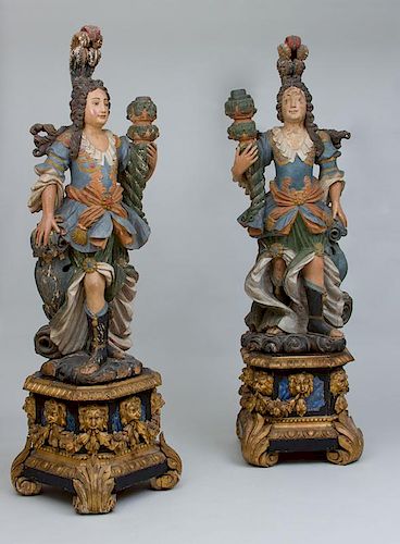 PAIR OF LUSO-BRAZILIAN BAROQUE POLYCHROME PAINTED TORCHÈRES