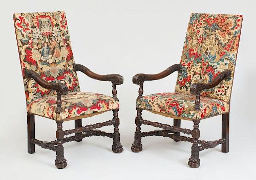 PAIR OF FRANCO-FLEMISH BAROQUE CARVED WALNUT TALL-BACK ARMCHAIRS