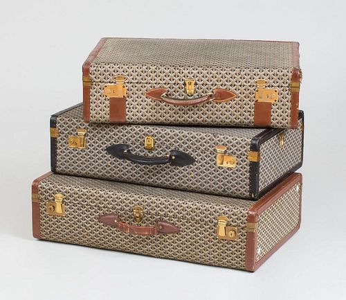 SET OF THREE GOYARD LEATHER-LINED BLACK AND TAN CROISIÈRE SUITCASE