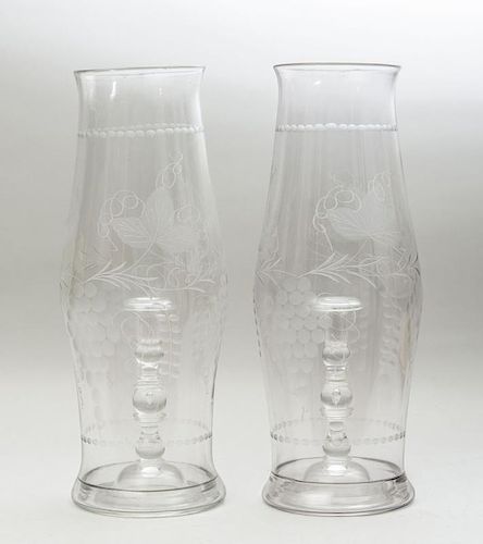 PAIR OF ENGLISH ETCHED GLASS HURRICANE SHADES AND A PAIR OF STEUBEN GLASS TEAR-DROP CANDLESTICKS