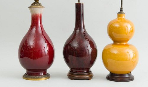 THREE CHINESE GLAZED PORCELAIN VASES, MOUNTED AS LAMPS