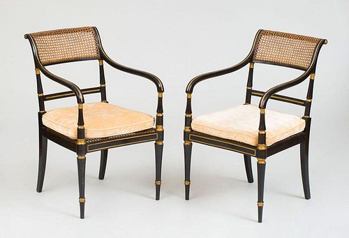 PAIR OF GEORGE III BLACK JAPANNED AND PARCEL-GILT ARMCHAIRS