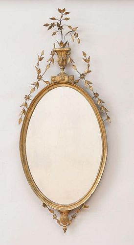 GEORGE III GILTWOOD AND GILT COMPOSITION OVAL MIRROR