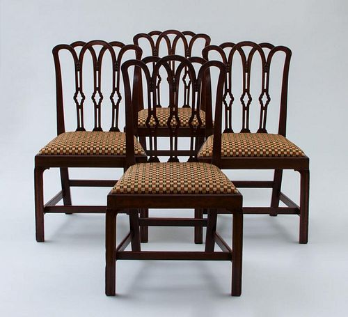 SET OF FOUR GEORGE III CARVED MAHOGANY SIDE CHAIRS, IN THE NEO-GOTHIC TASTE
