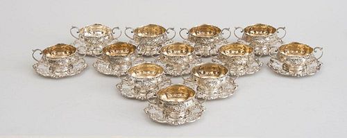 SET OF TWELVE AMERICAN SILVER TWO-HANDLED BOULLION CUPS AND TWELVE STANDS