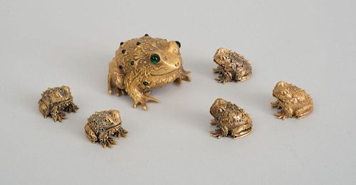 SET OF FIVE GILT-METAL MINIATURE FROGS AND A MATCHING LARGER FROG