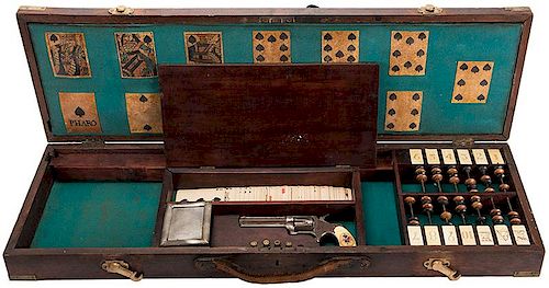 Gambler’s Case with Cards, Faro Layout, Revolver, Dealing Box and more.