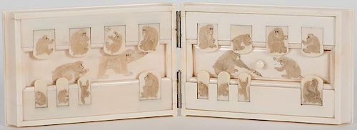 Solid Ivory Folding Cribbage Board and Two Ivory Bezique Markers with Monkeys Carved in High Relief.