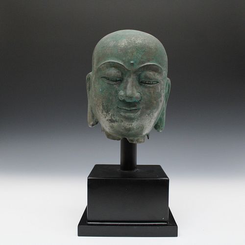 A Chinese Bronze Head of a Luohan Probably from Yuan- Ming Dynasty

H with Stand: Approximately 37cm
H: Approximately 22cm
W: Approximately 15.5cm 