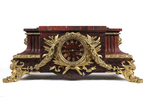 A Parisian Belle Époque Griotte Marble and Bronze Gilt Mantel Clock from the Late 19th Century. 