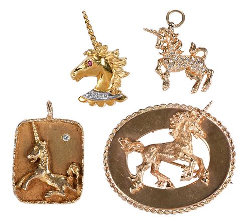 Four Gold Unicorn Jewelry Brooches and Pendants