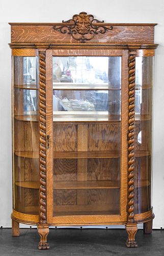 OAK CHINA CABINET WITH CARVED GREENMAN