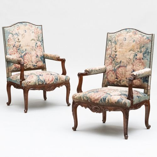 Pair of Régence Style Carved Beechwood and Tapestry Upholstered Fauteuils à la Reine