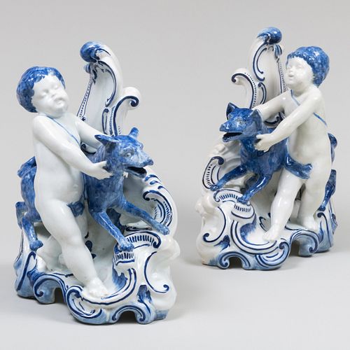 Pair of Dutch Delft Blue and White Chenets with Putti